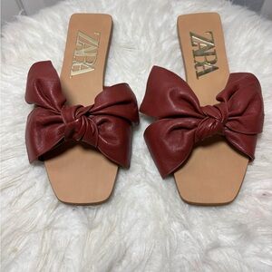 Zara leather slide sandals featuring a decorative bow flat design, square toe